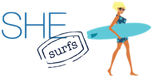 SHE surfs